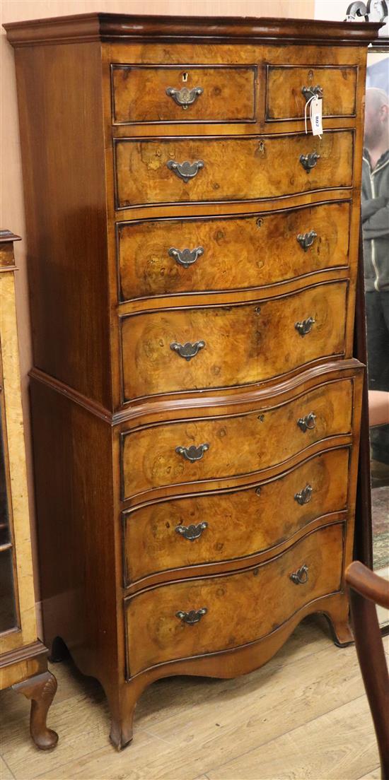 A Georgian style serpentine-fronted walnut tallboy fitted two short drawers and six long drawers H.154cm